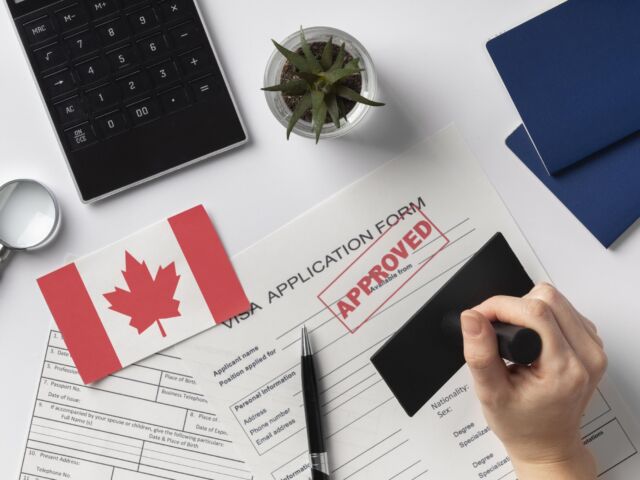visa-application-composition-with-canadian-flag