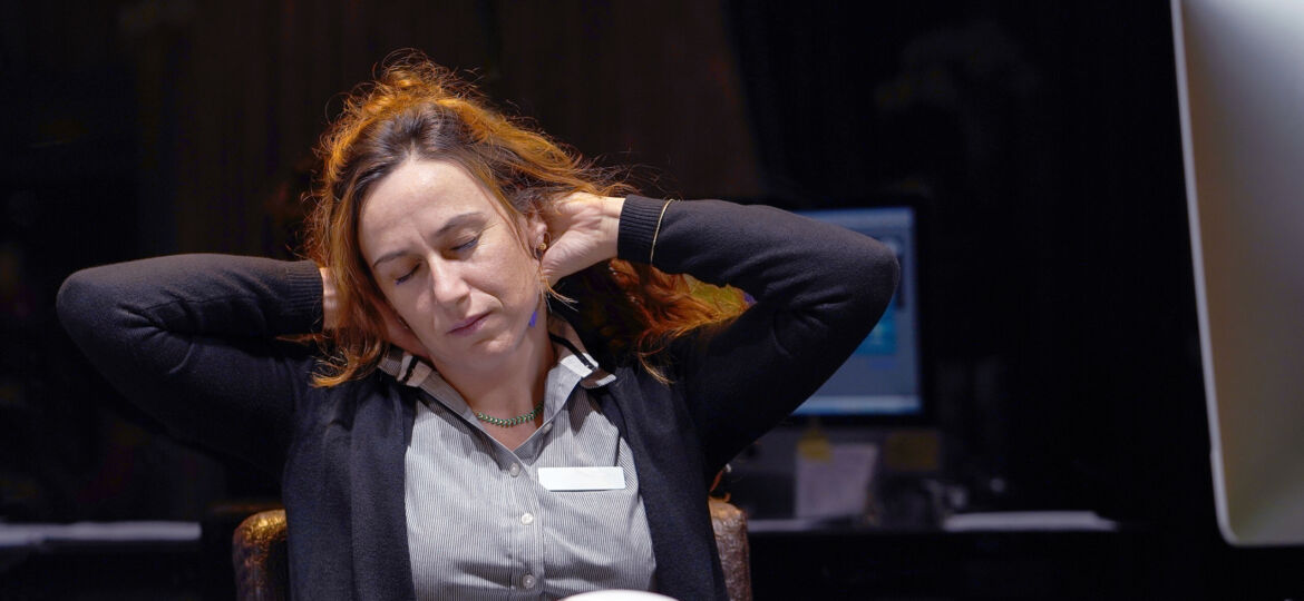 Woman in stress in front of computer