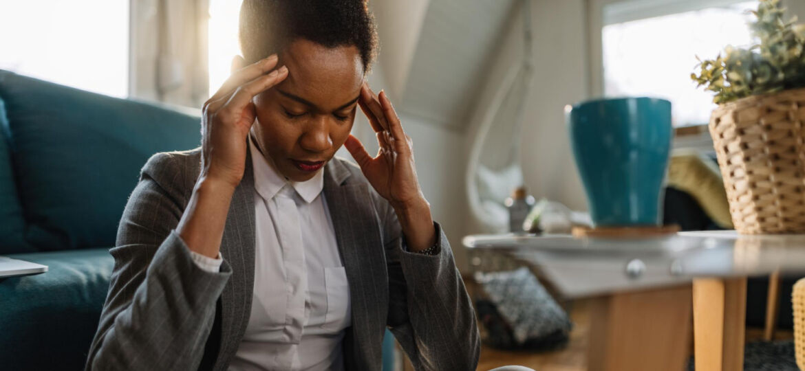 african-american-businesswoman-having-headache-feeling-tired-while-working-home