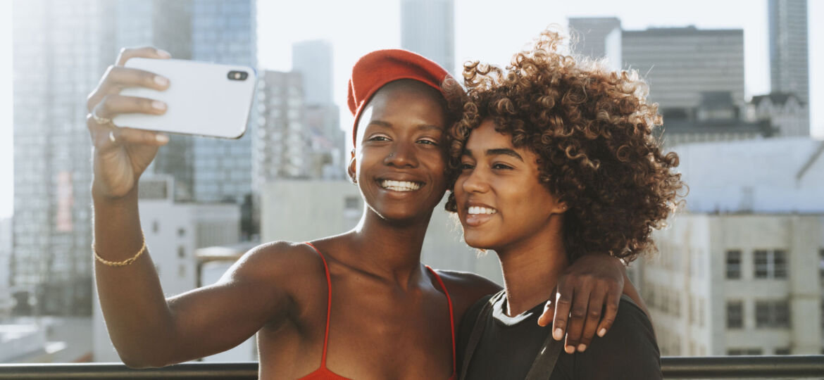 Girls taking a selfie at a rooftop