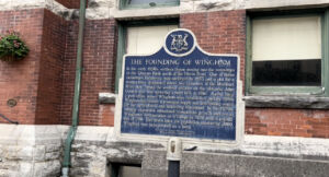 Sign describing the history of Wingham, Ontario, Canada 