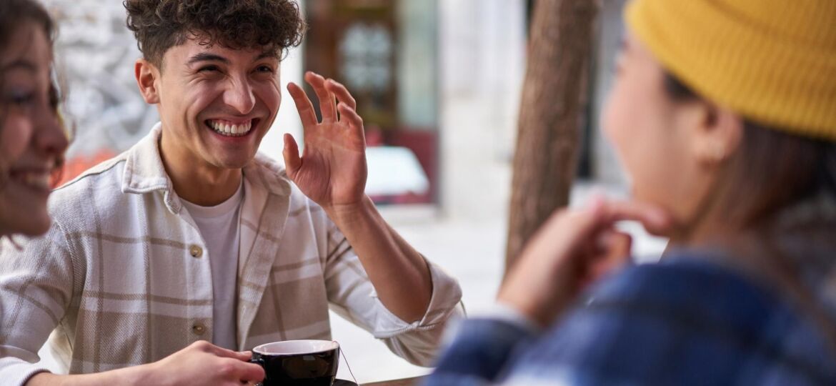 Young person laughing and showing good communication