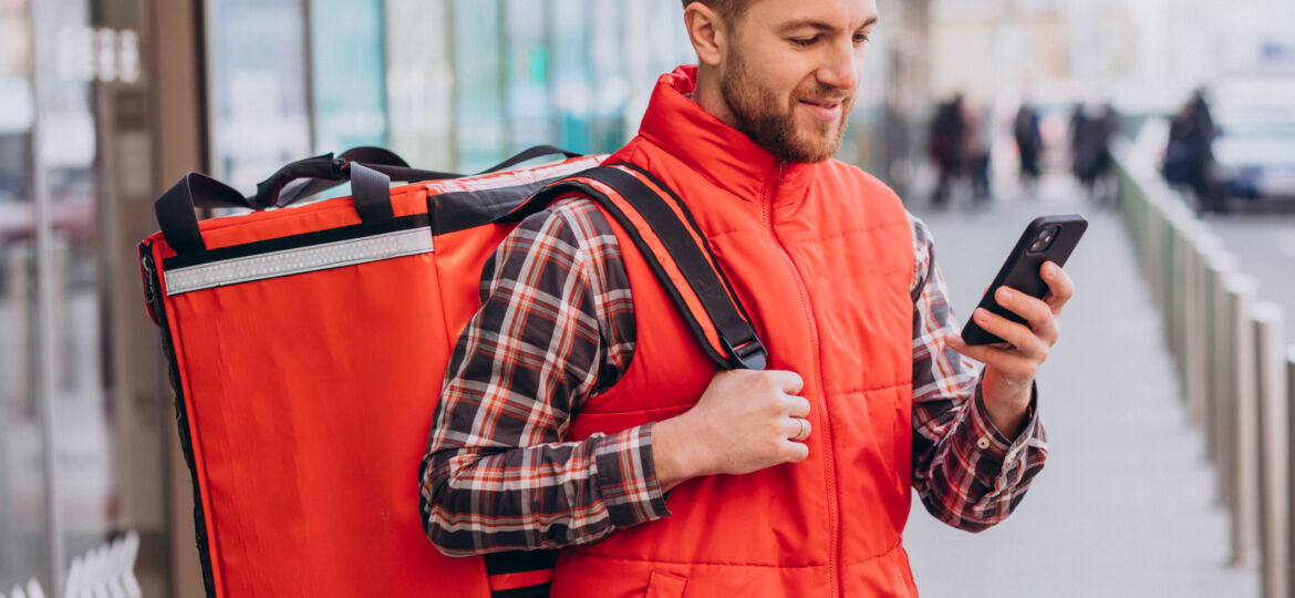 Food delivery man with boxes with food
