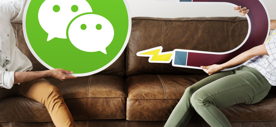 People holding coin and magnet