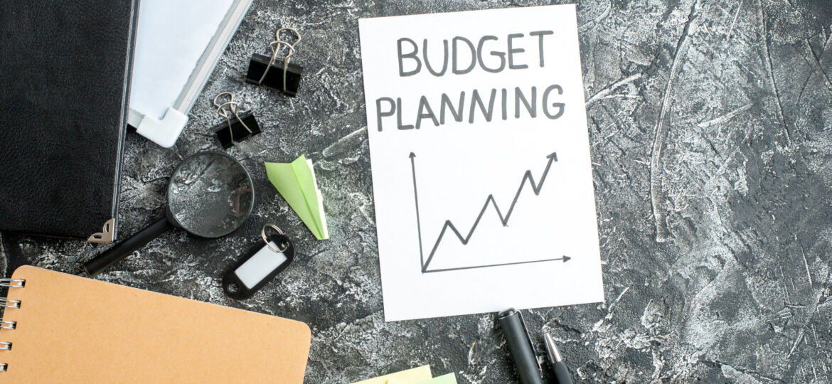top-view-budget-planning-note-with-pens-gray-surface-job-copybook-school-student-business-work-college-money-budget