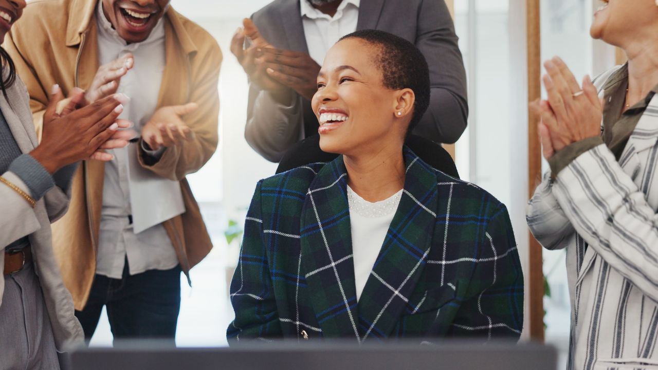 Black woman, congratulations and business team applause, happiness and celebrate winning, success or growth. Winner, thank you and people clapping for promotion opportunity, goals or PC announcement.