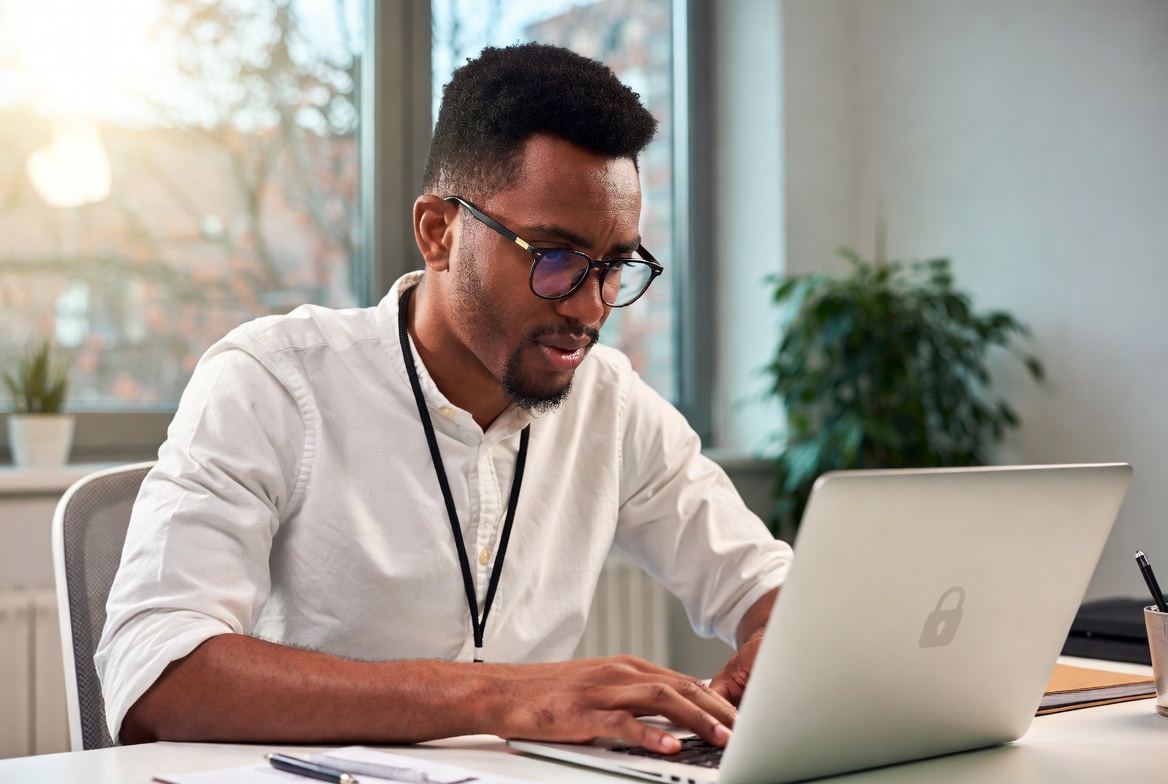 Small business owner managing IT challenges